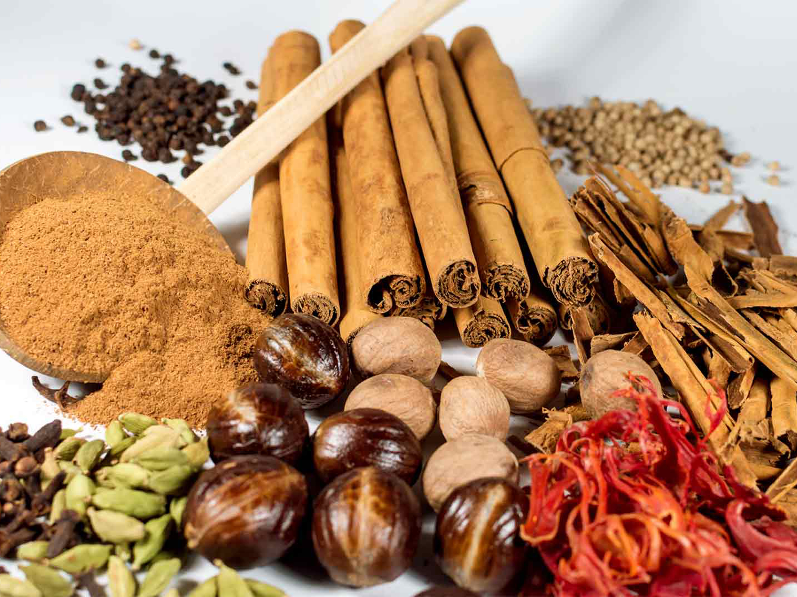 An assortment of Sri Lankan spices including cinnamon and cardamom